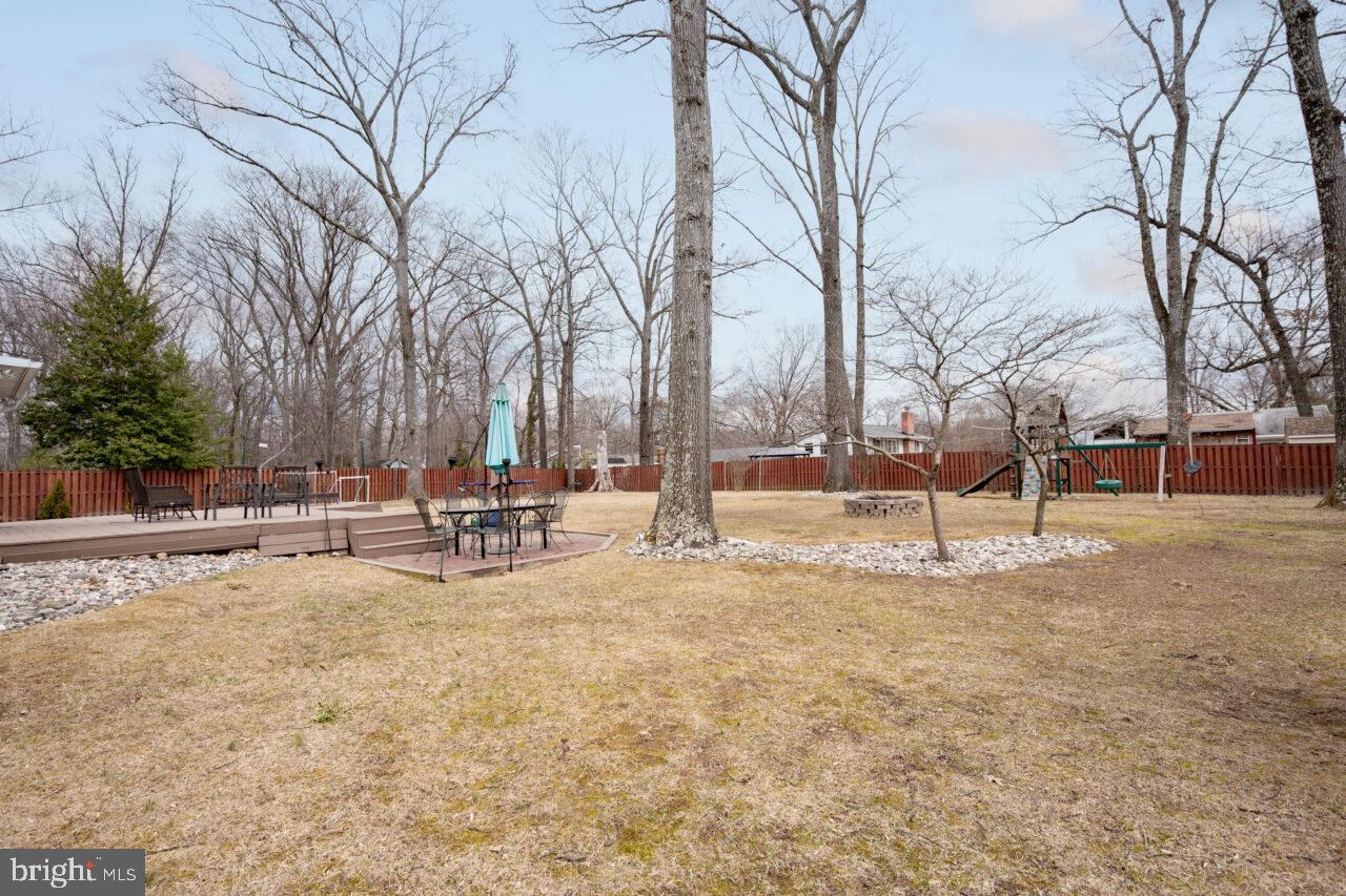 2405 Cedar Lane Vienna, VA 22180 - Photo 6 of 56 a view of yard with swimming pool and sitting area