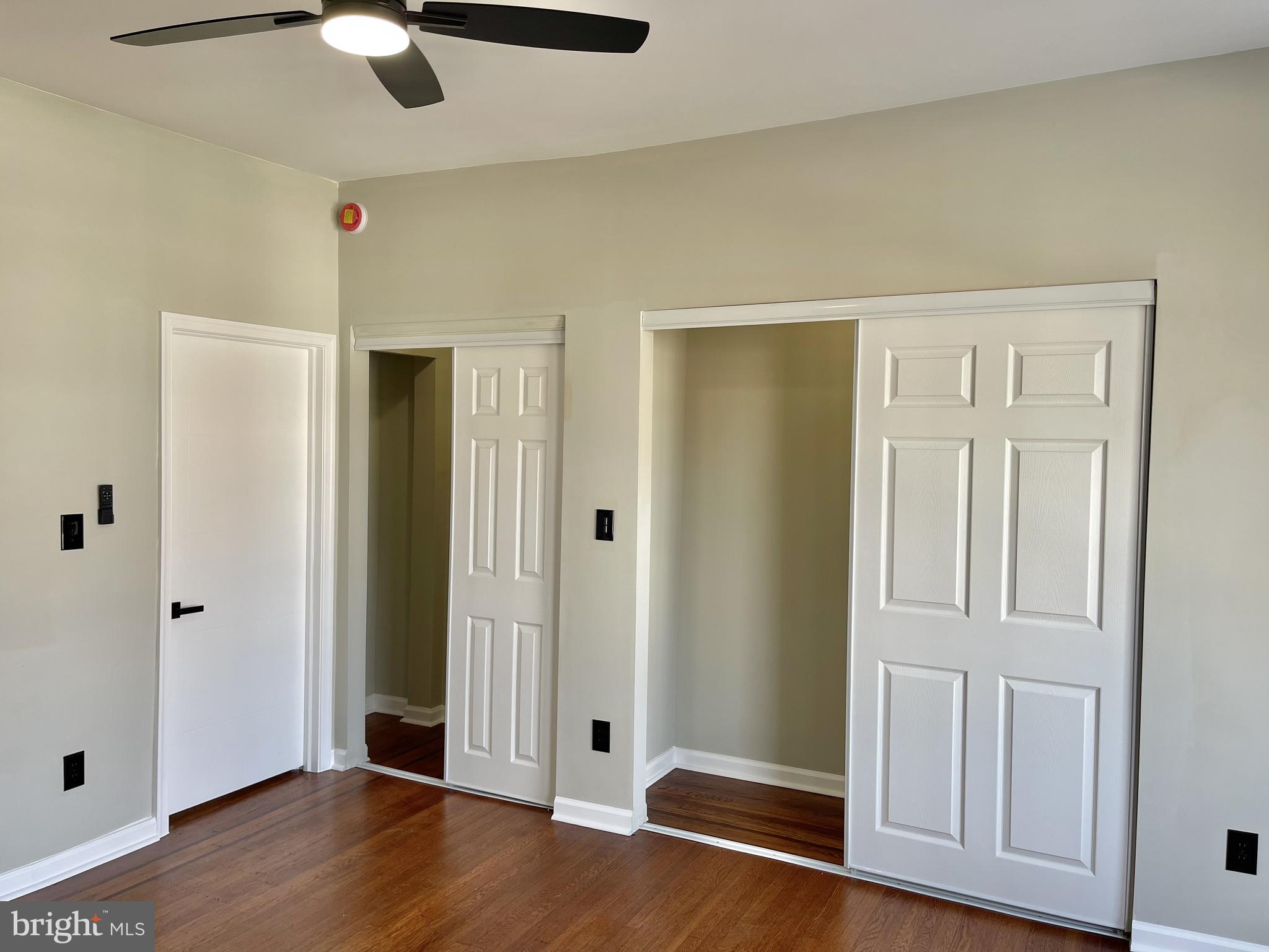 320 West Tabor Road Philadelphia, PA 19120 - Photo 15 of 33 an empty room with wooden floor closet and windows