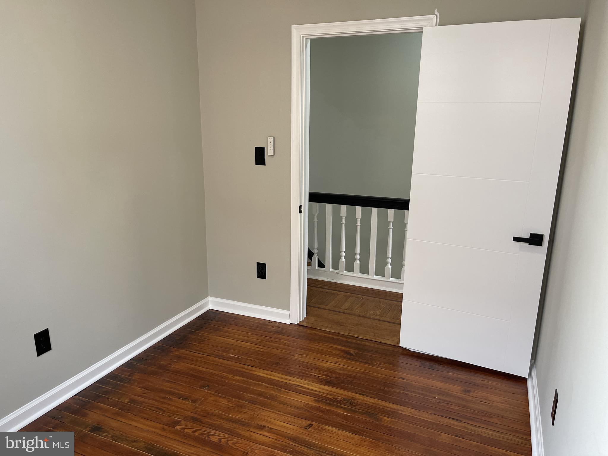 320 West Tabor Road Philadelphia, PA 19120 - Photo 18 of 33 a view of a hallway with wooden floor