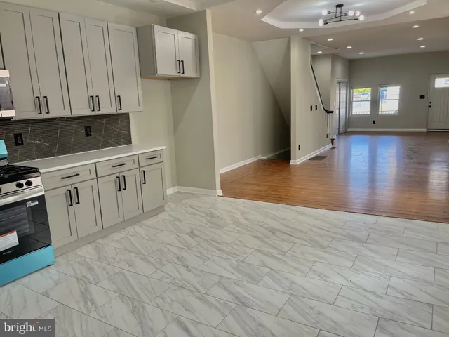 a view of a kitchen with a sink