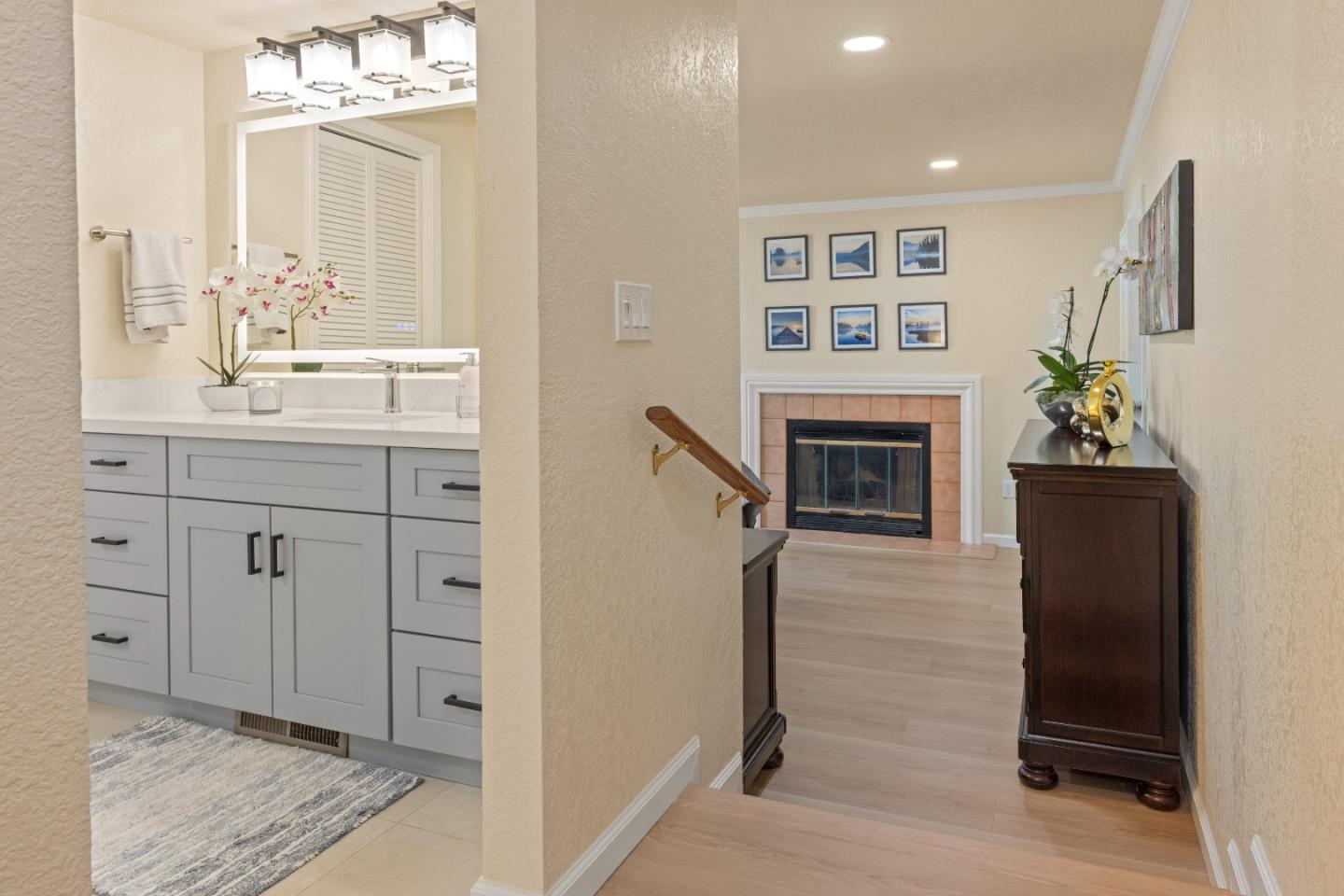 2896 Ransford Avenue Pacific Grove, CA 93950 - Photo 16 of 28 a spacious bathroom with a double vanity sink and a mirror