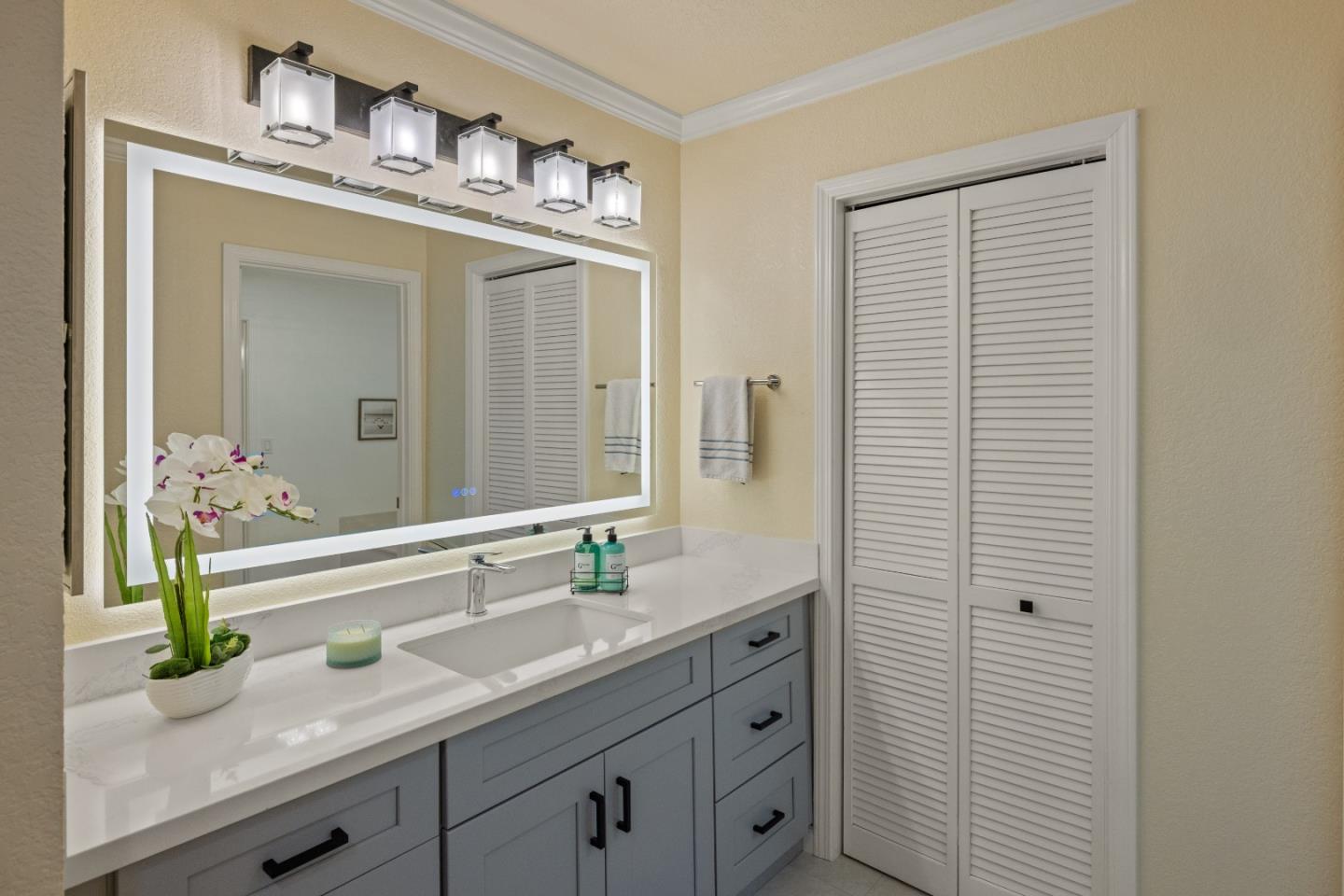 2896 Ransford Avenue Pacific Grove, CA 93950 - Photo 19 of 28 a bathroom with a sink and a mirror
