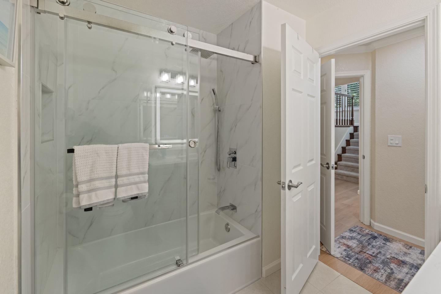 2896 Ransford Avenue Pacific Grove, CA 93950 - Photo 23 of 28 a bathroom with a shower and a bath tub