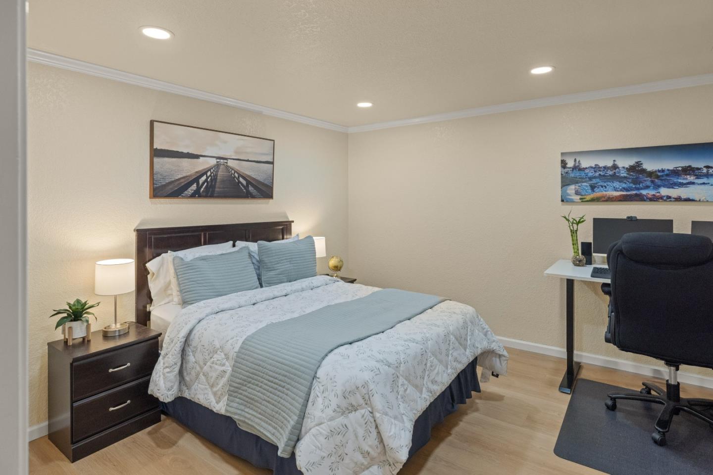 2896 Ransford Avenue Pacific Grove, CA 93950 - Photo 25 of 28 a bedroom with a bed and a workspace