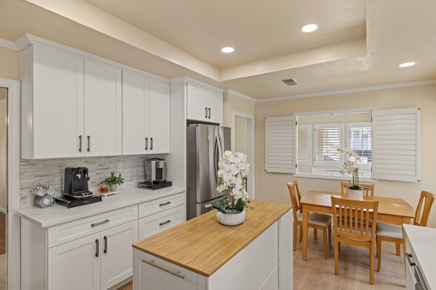 2896 Ransford Avenue Pacific Grove, CA 93950 - Photo 7 of 28 a kitchen with a refrigerator and cabinets