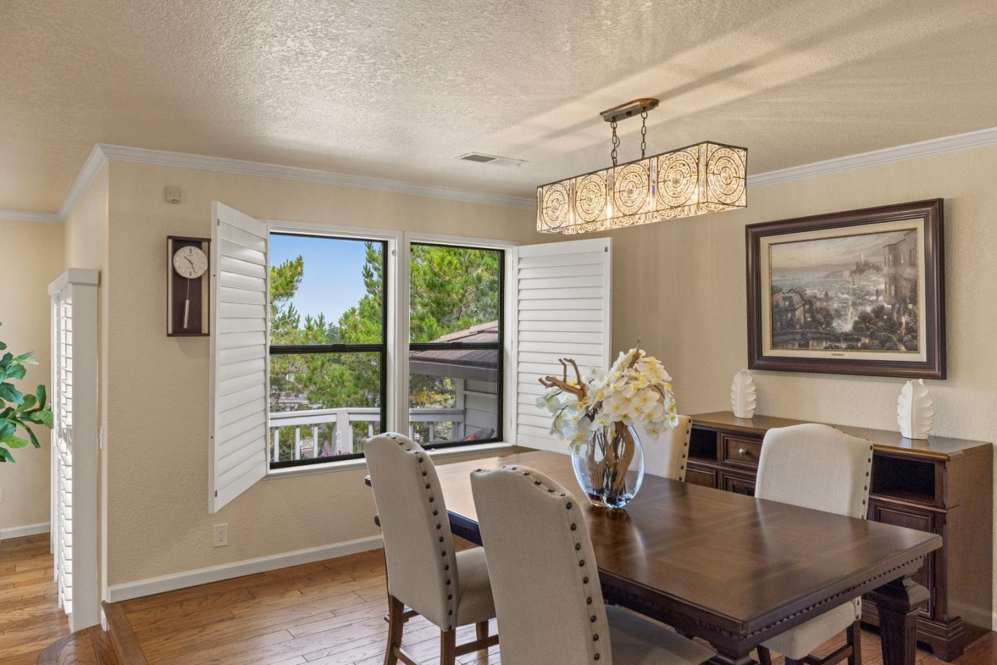 2896 Ransford Avenue Pacific Grove, CA 93950 - Photo 8 of 28 a view of a dining room with furniture window and wooden floor