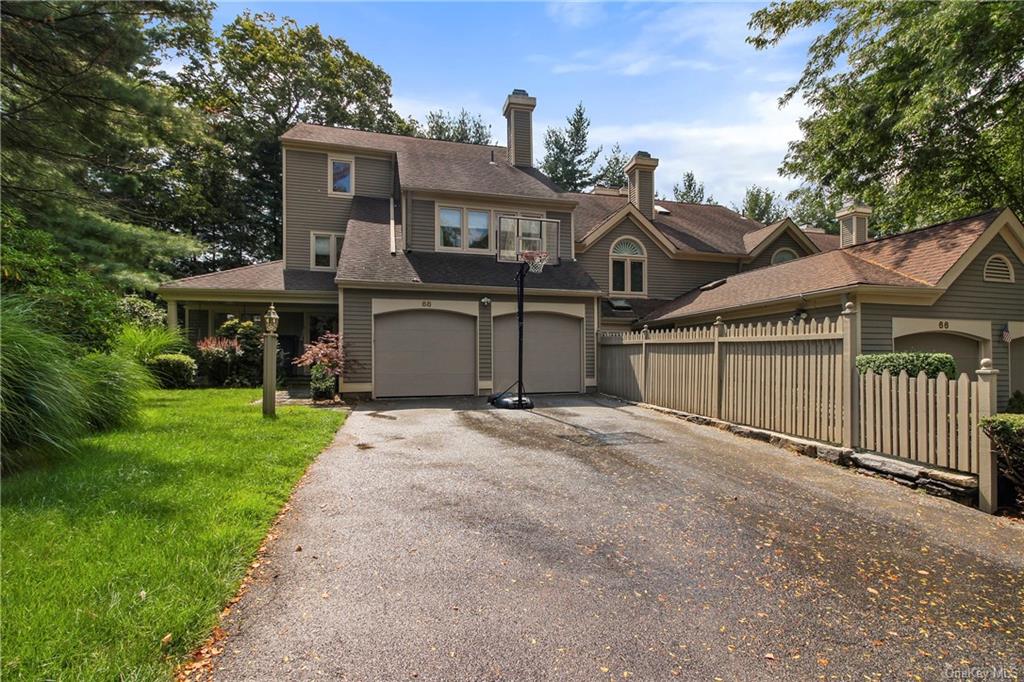 Welcome home to this Kensington model end unit with an attached 2 car garage.