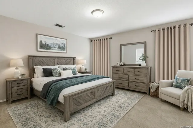 a spacious bedroom with a bed and furniture