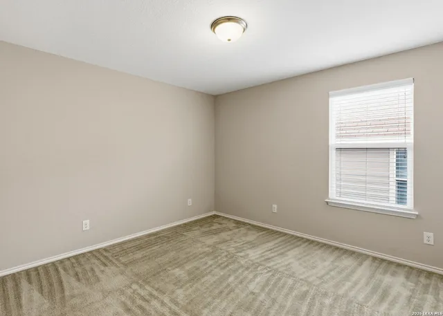 a view of empty room with window