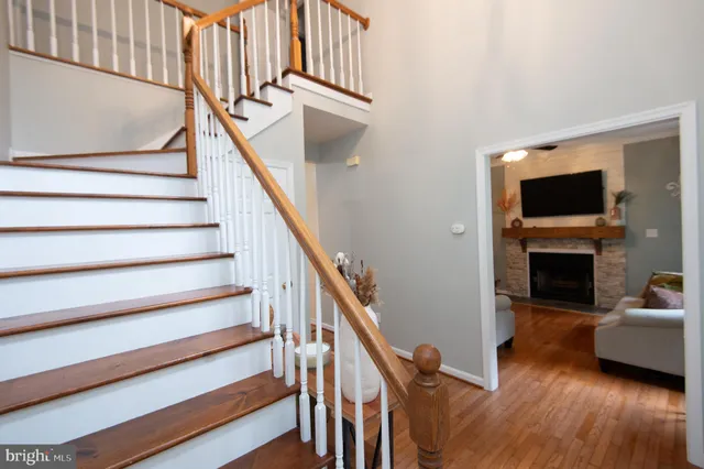 a view of a livingroom with furniture and a fireplace