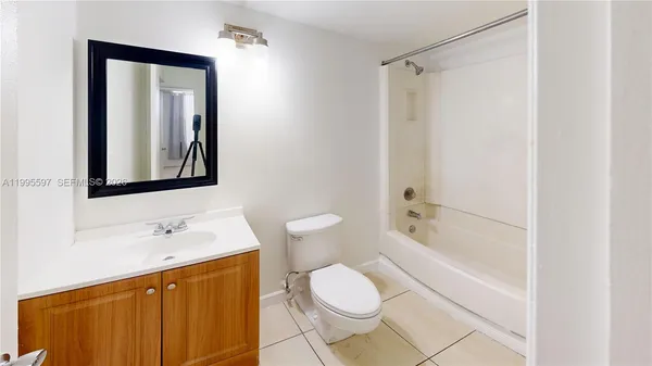 a view of a balcony with plants