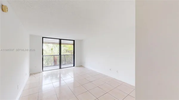 a view of an empty room with window