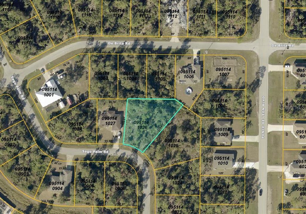 Sago Palm Rd Port North Port, FL 34291 - Photo 1 of 1 an aerial view of a residential apartment building with a yard