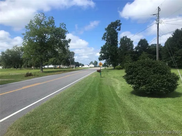 a view of a golf course with a lake