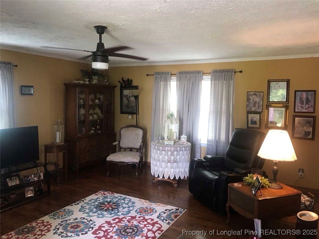 2067 North Broadridge Road Lumberton, NC 28358 - Photo 2 of 14 a living room with furniture and a flat screen tv