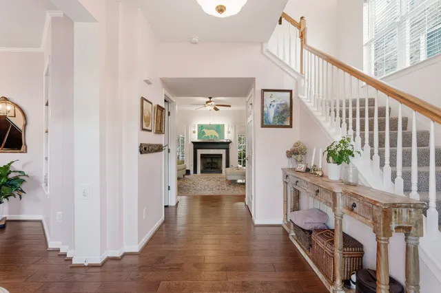 a view of living room kitchen and hardwood floor