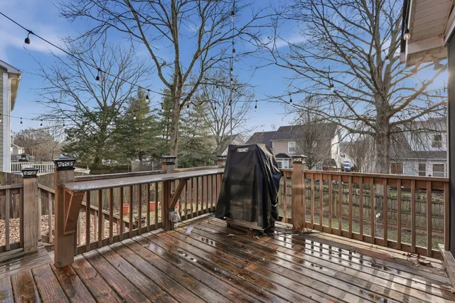 a view of deck with wooden floor and fence