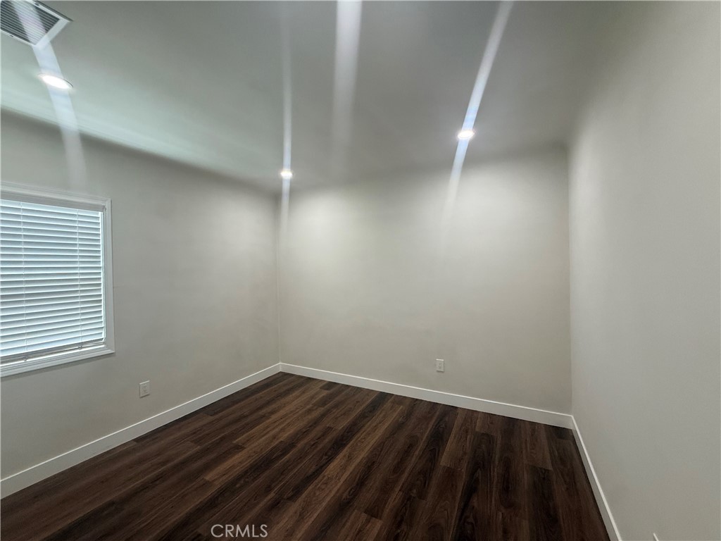 3688 Taft Street Riverside, CA 92503 - Photo 10 of 15 a view of small space with wooden floor and window