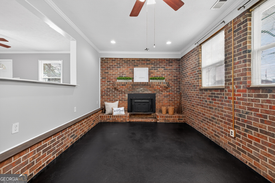 11 Johnston Road Griffin, GA 30224 - Photo 14 of 46 a view of an empty room with a fireplace