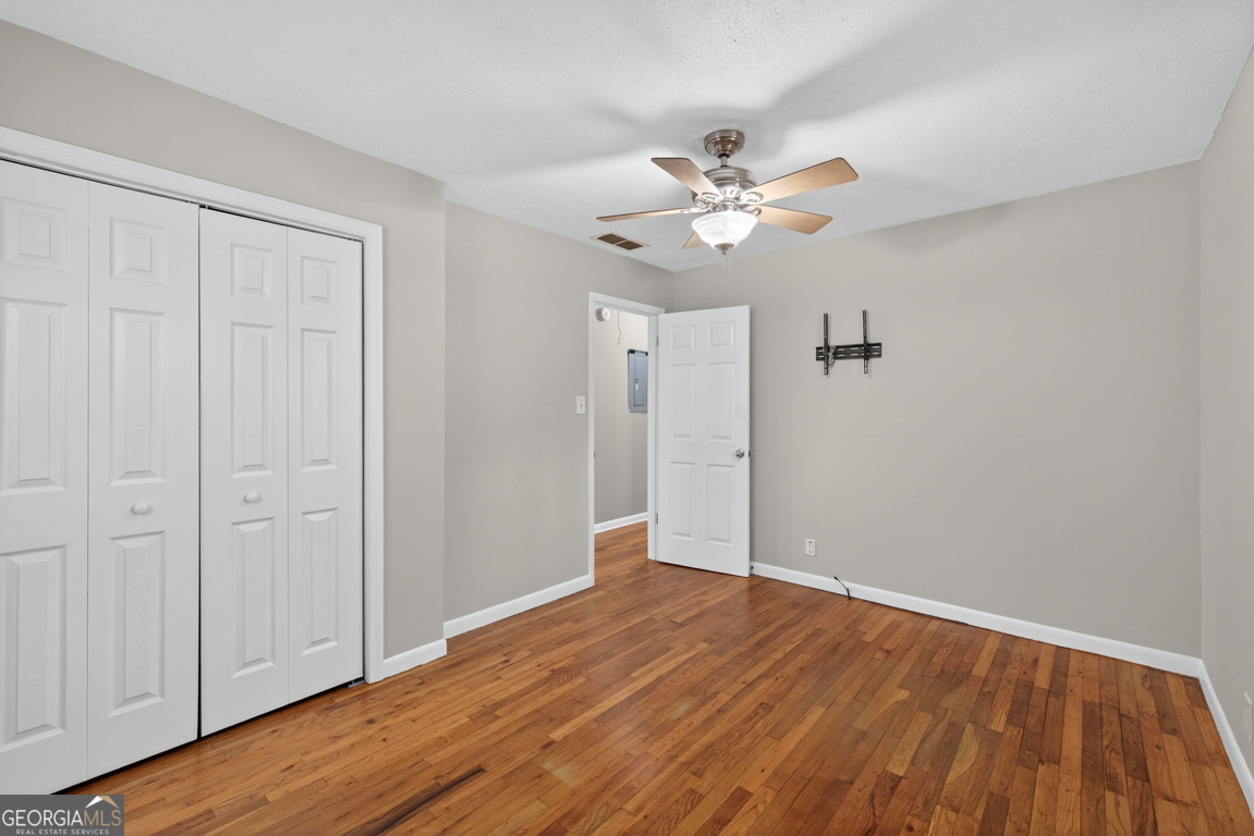 11 Johnston Road Griffin, GA 30224 - Photo 26 of 46 a view of empty room with wooden floor