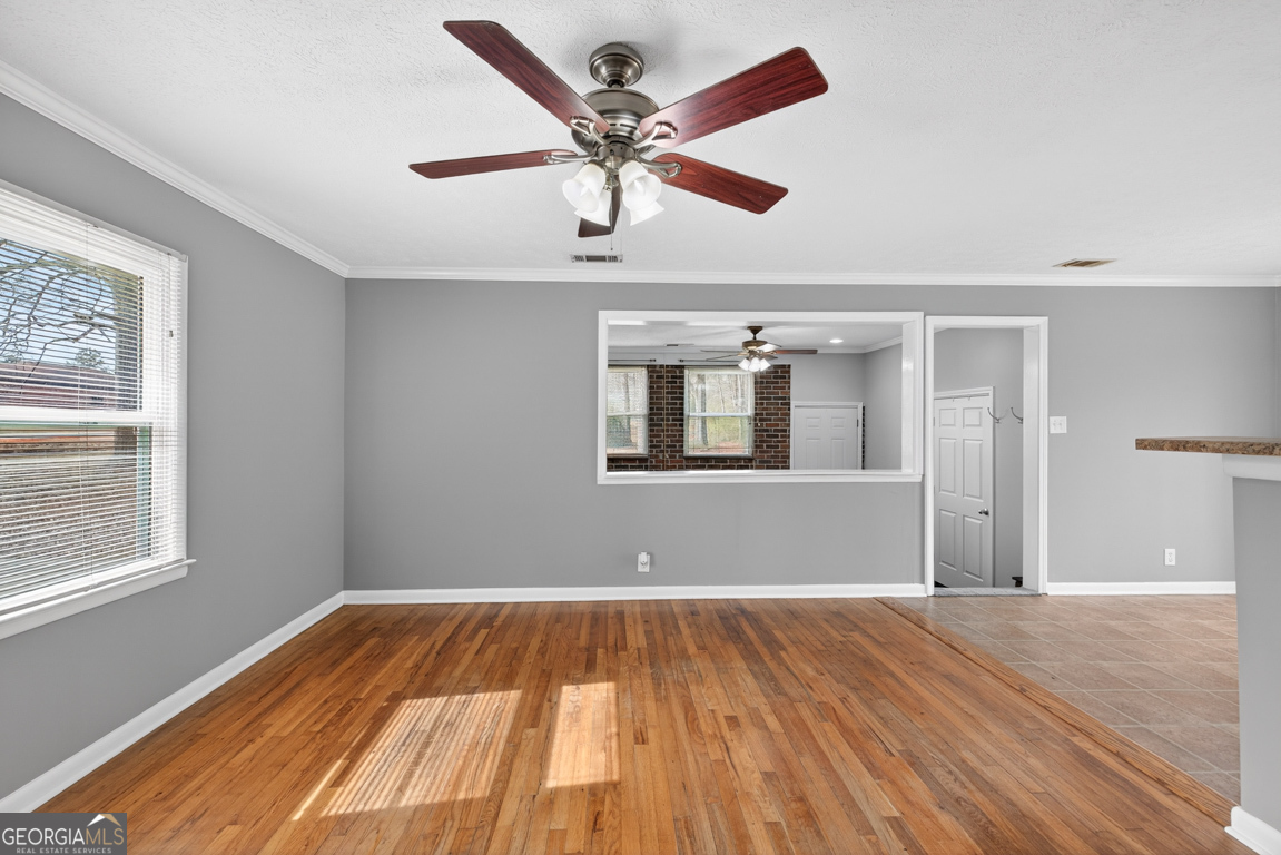 11 Johnston Road Griffin, GA 30224 - Photo 3 of 46 a view of empty room with wooden floor