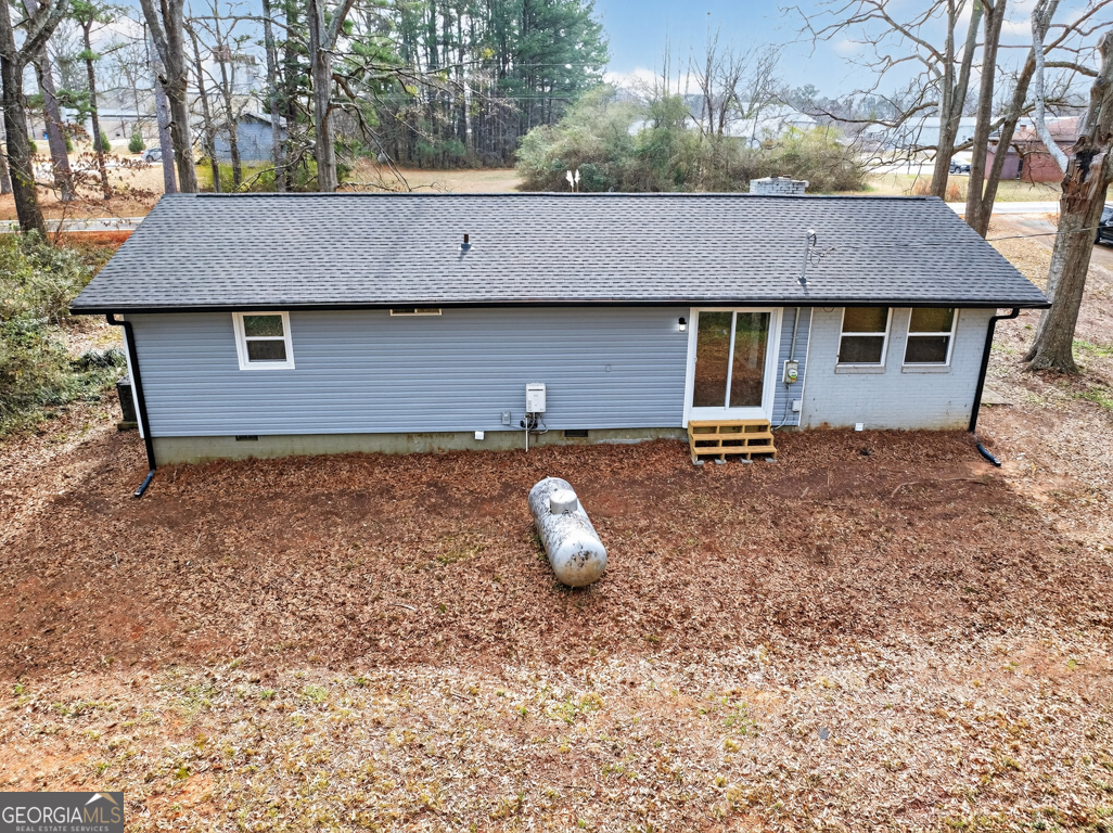 11 Johnston Road Griffin, GA 30224 - Photo 34 of 46 a backyard of a house with table and chairs