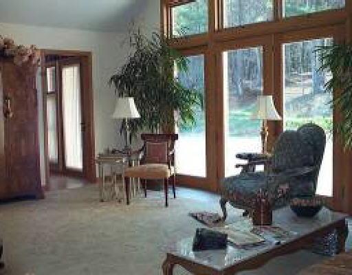 269 Roberson Mill Road Southeast Floyd, VA 24091 - Photo 4 of 5 a living room with furniture a table and a large window