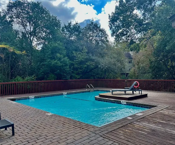 a view of a back yard with a patio