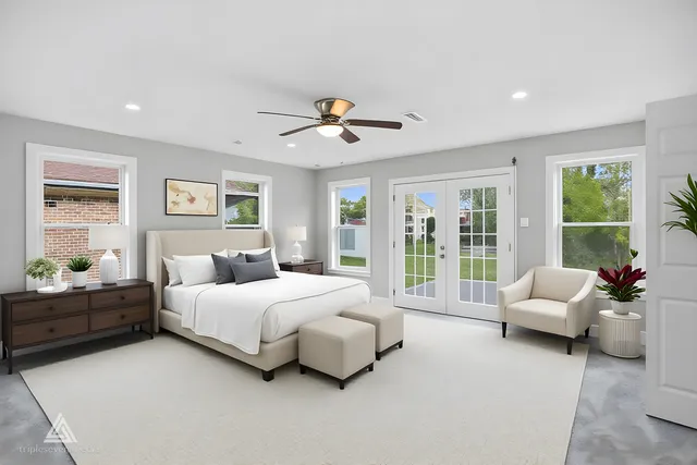 a spacious bedroom with a bed and glass window