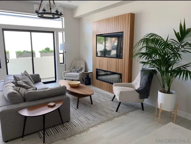 a view of a balcony with sitting area