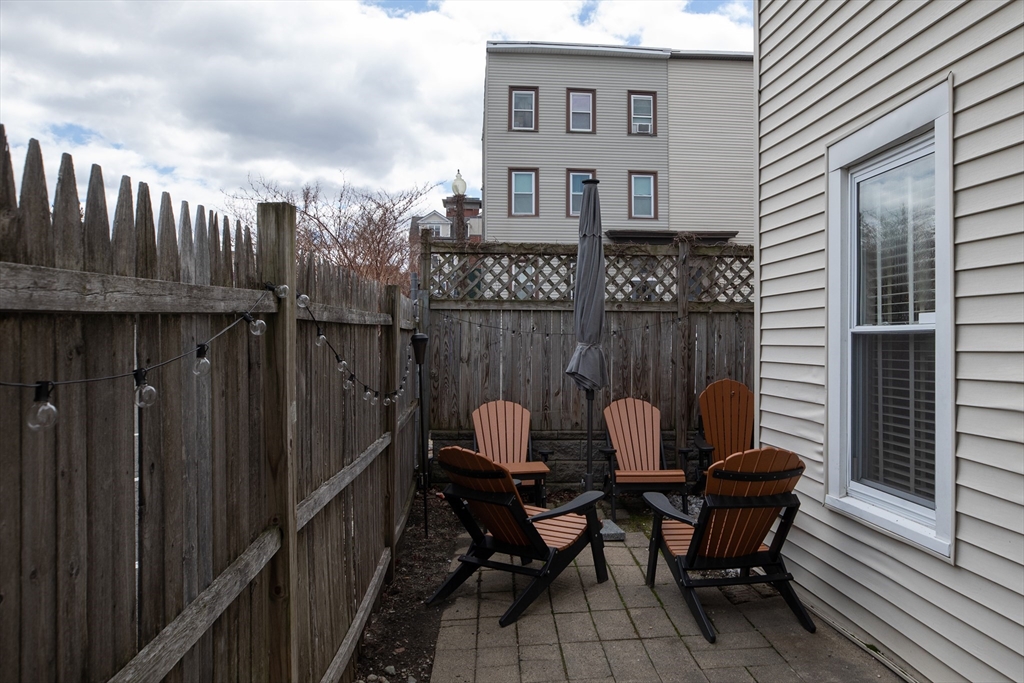 571 East 3rd Street Boston, MA 02127 - Photo 20 of 20 a view of a chairs and table in the balcony