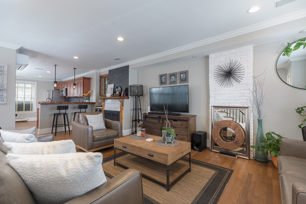 571 East 3rd Street Boston, MA 02127 - Photo 5 of 20 a living room with furniture and a flat screen tv