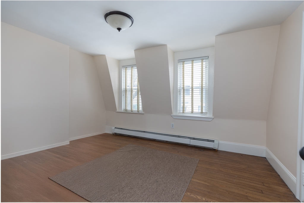 571 East 3rd Street Boston, MA 02127 - Photo 9 of 20 an empty room with windows