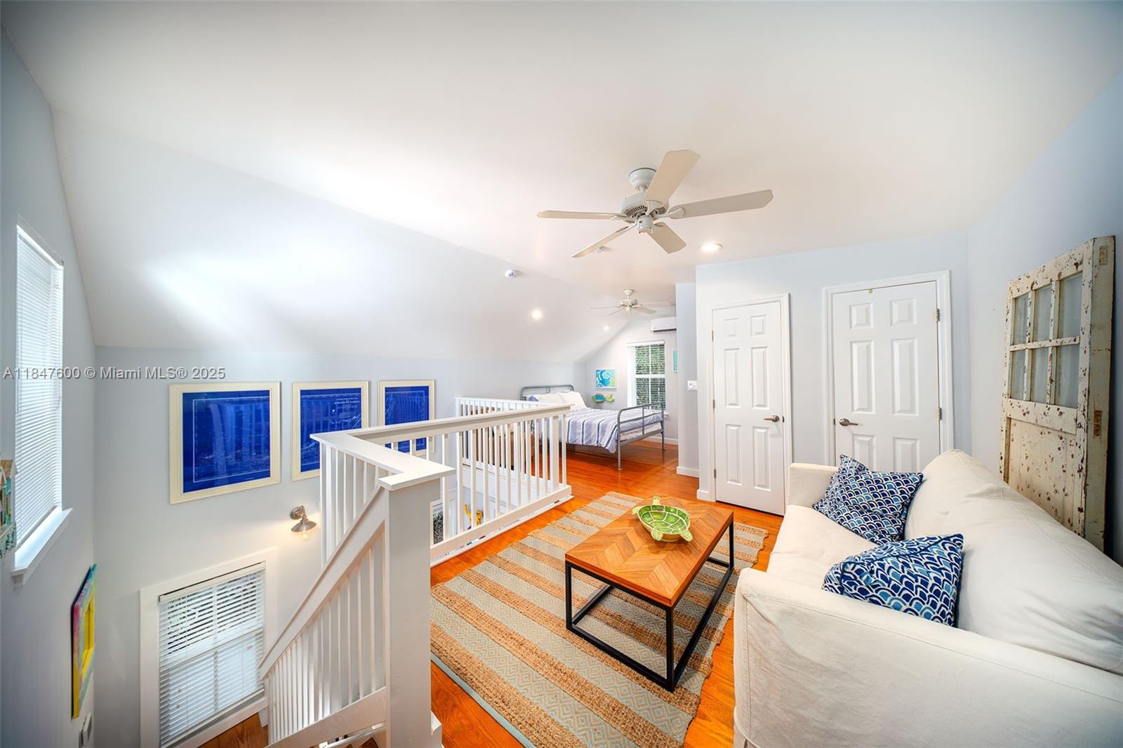 1114 Packer Street Key West, FL 33040 - Photo 27 of 98 a living room with furniture and a large window