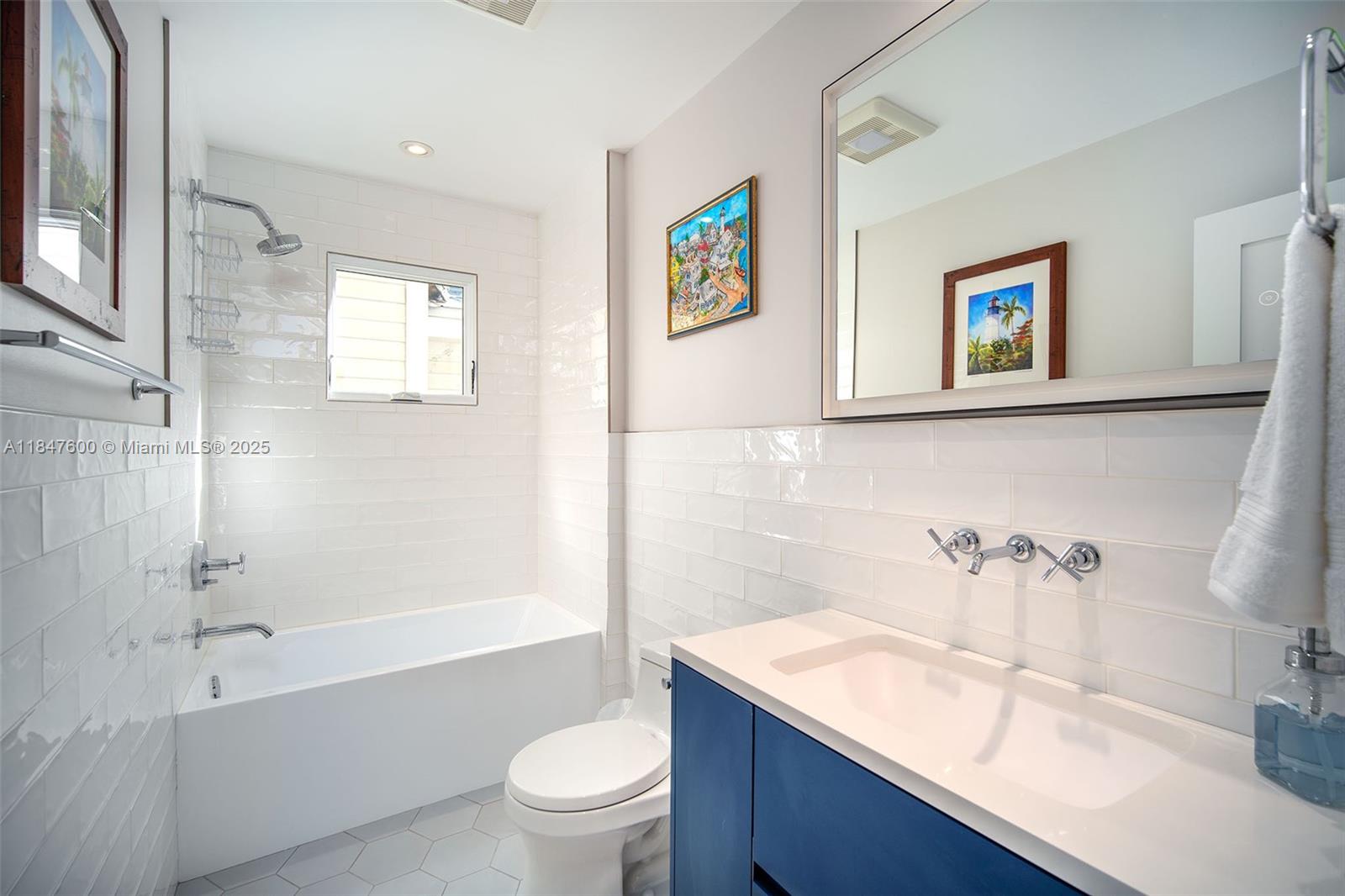 1114 Packer Street Key West, FL 33040 - Photo 33 of 98 a bathroom with a sink a toilet and a bathtub