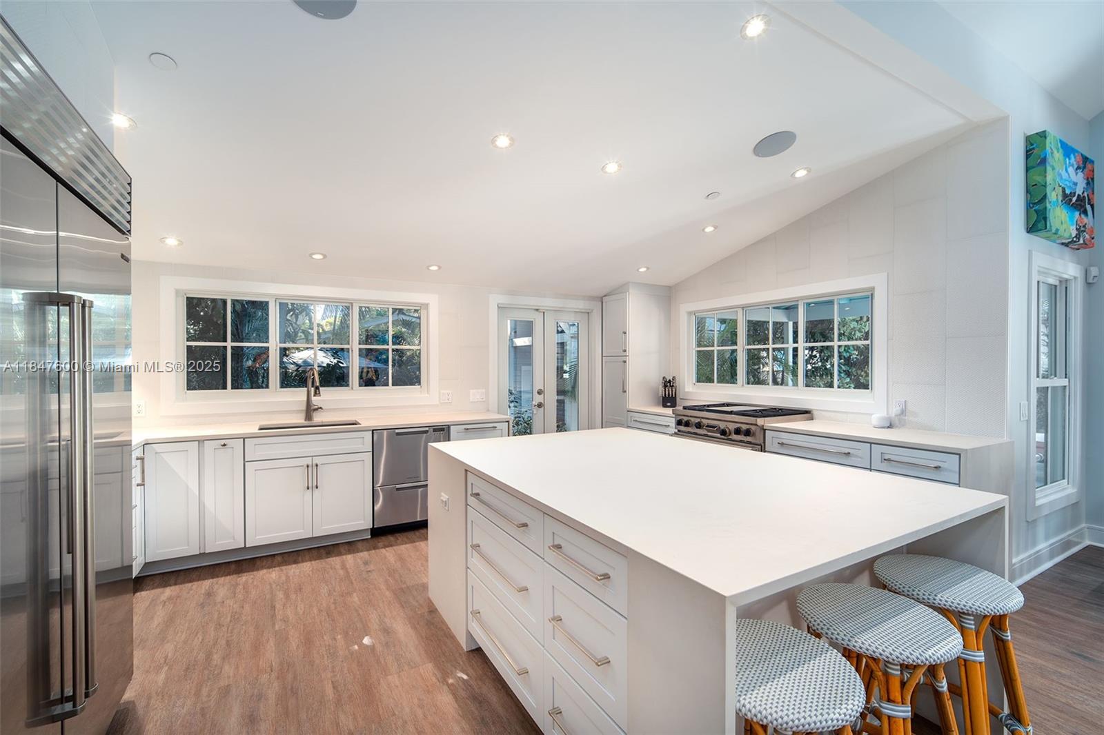 1114 Packer Street Key West, FL 33040 - Photo 42 of 98 a large white kitchen with a large window