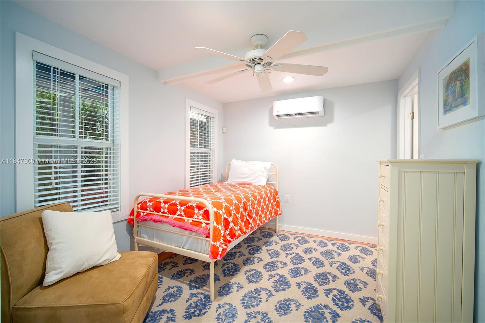 1114 Packer Street Key West, FL 33040 - Photo 73 of 98 a bedroom with a bed and wooden floor