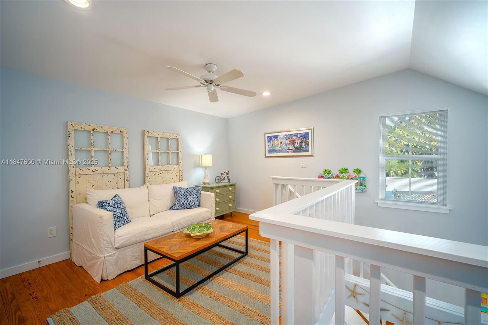 1114 Packer Street Key West, FL 33040 - Photo 76 of 98 a living room with furniture and a wooden floor
