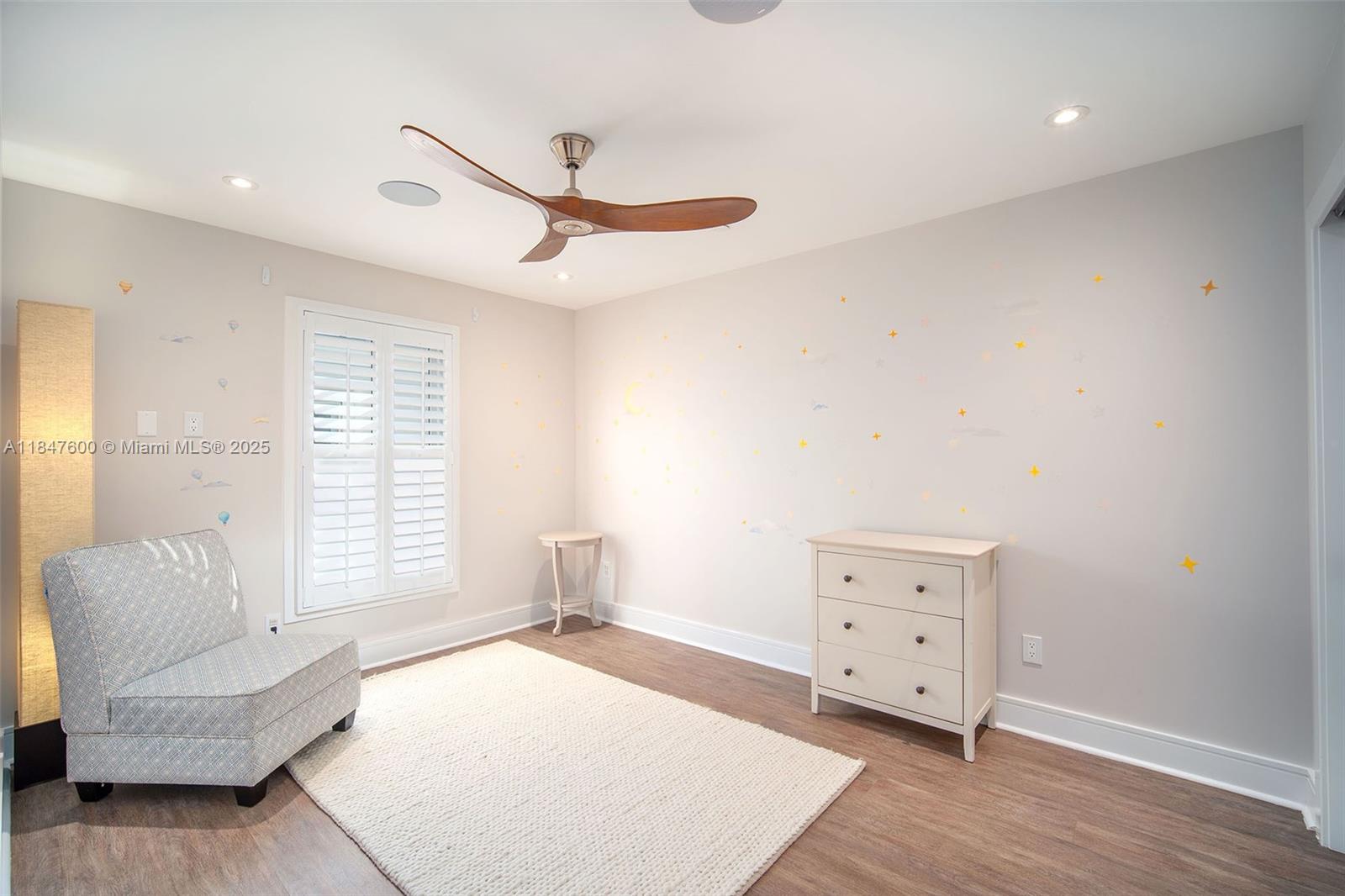 1114 Packer Street Key West, FL 33040 - Photo 83 of 98 a spacious bedroom with a bed and a couch