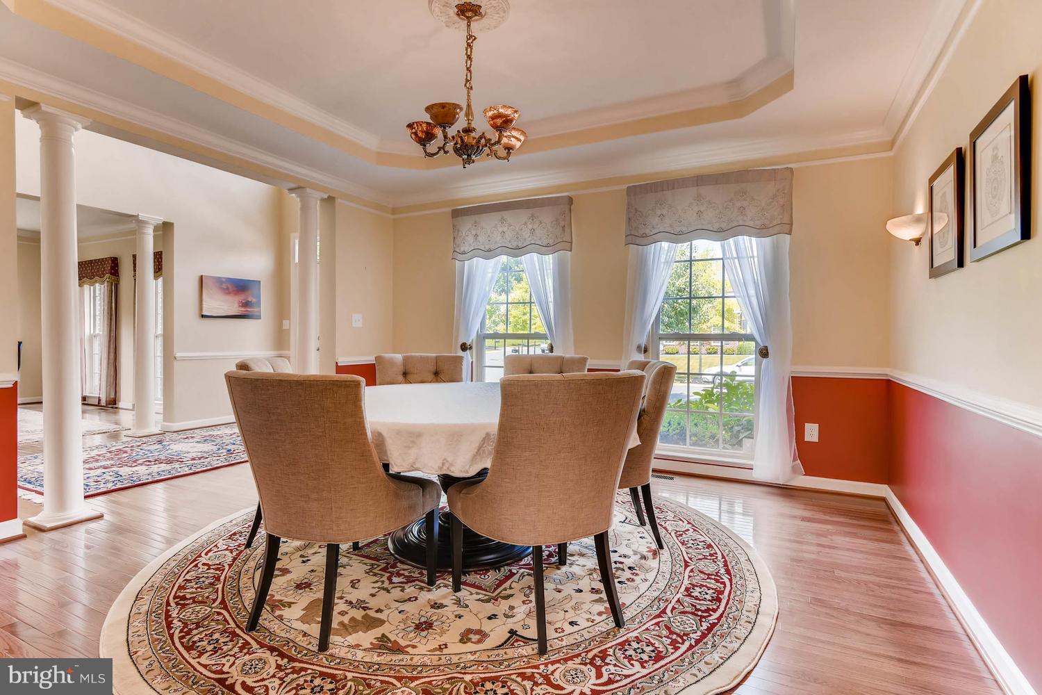 Dining Room with tray ceiling & moldings