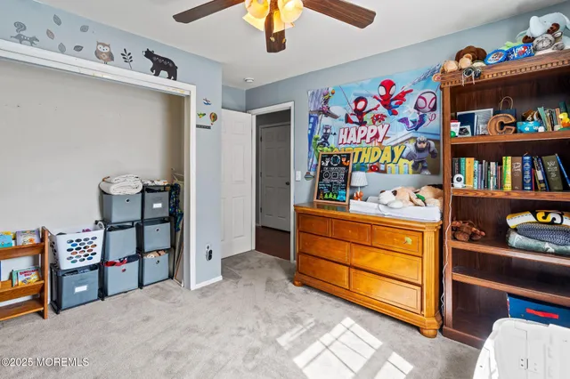 a room with toys and storage racks