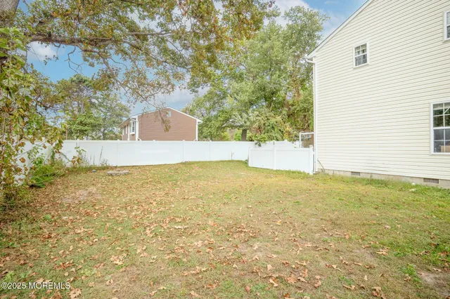 a view of an outdoor space and a yard