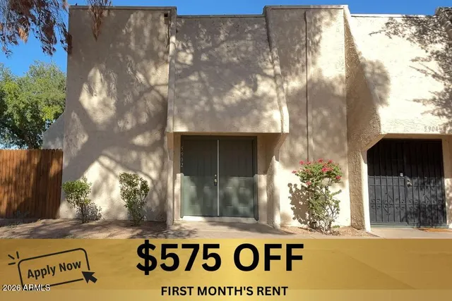 a view of a door with a tree