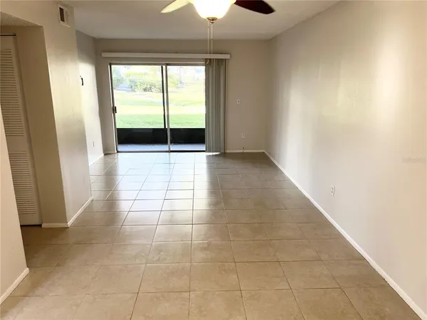 a view of an empty room and window