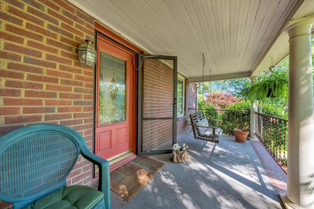 4400 Daugherty Road Salem, VA 24153 - Photo 5 of 32 a view of a porch with chairs and a backyard