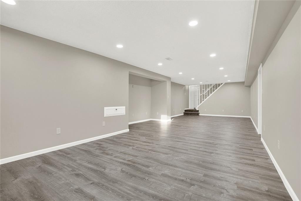 667 Old Frame Road Smithfield, PA 15478 - Photo 29 of 38 a view of empty room with wooden floor