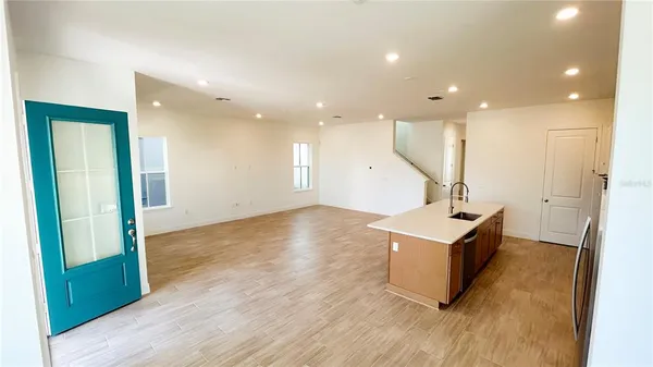 a view of kitchen with wooden floor