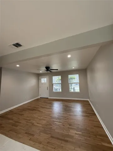 a view of an empty room and window