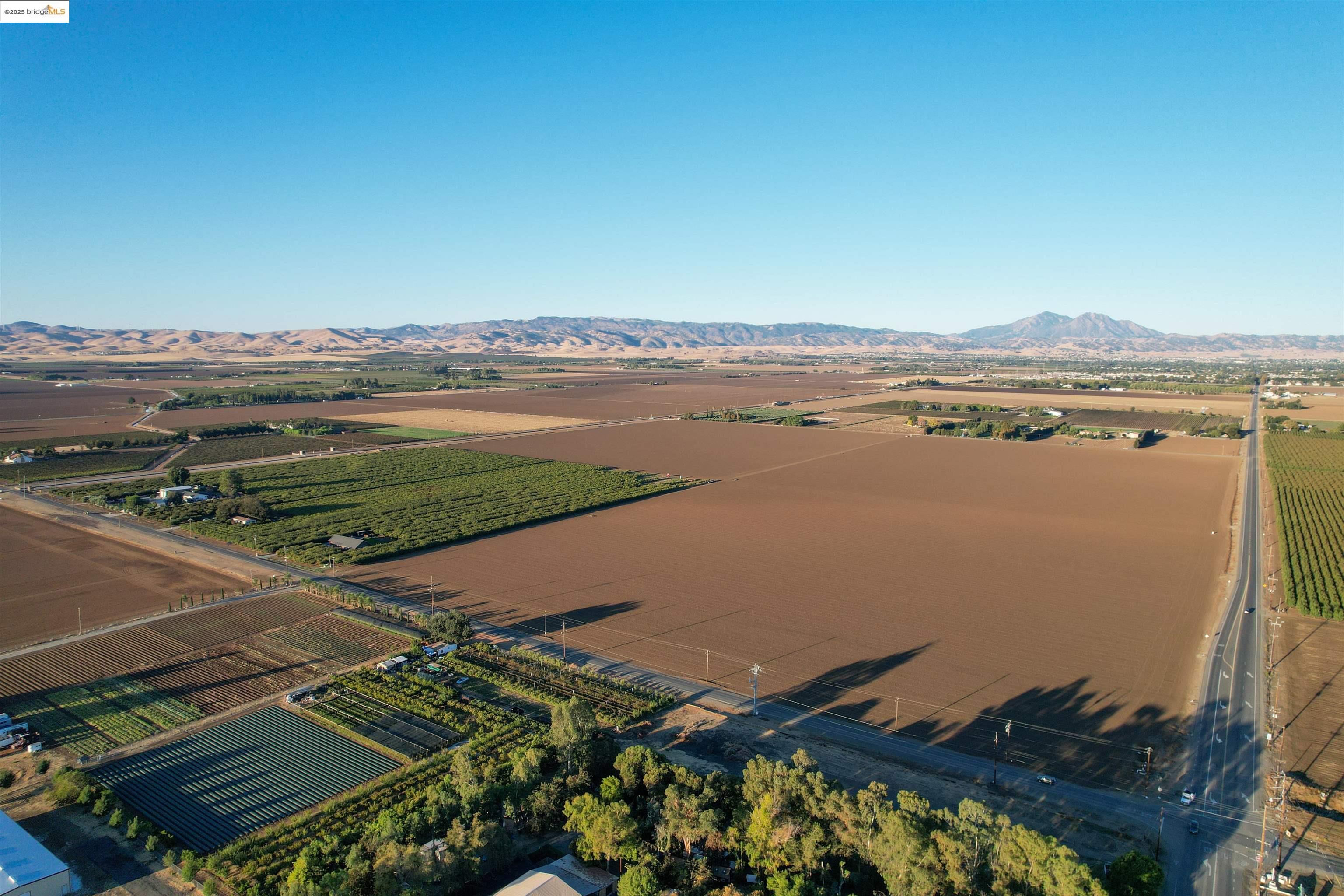 7170 Balfour Road Brentwood, CA 94513 - Photo 4 of 6 an aerial view of ocean and residential houses