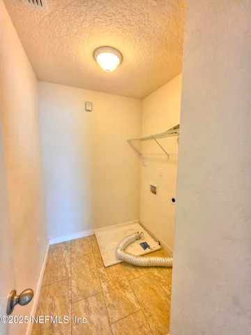 a bathroom with a sink and shower